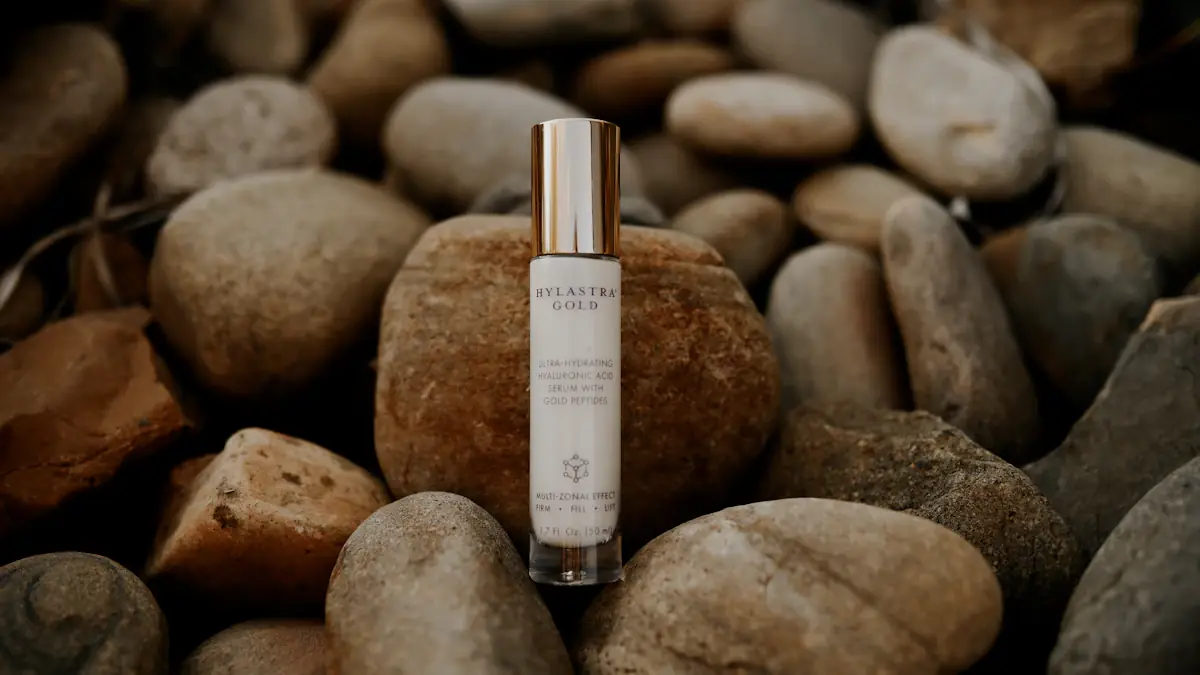A cosmetic product bottle photographed on stones, showing packaging and surface texture.