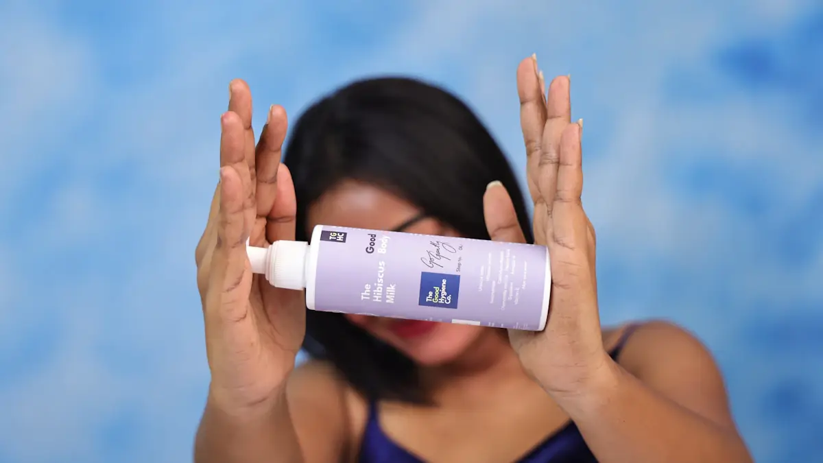 A presenter holding a product bottle toward the camera in a casual product introduction.